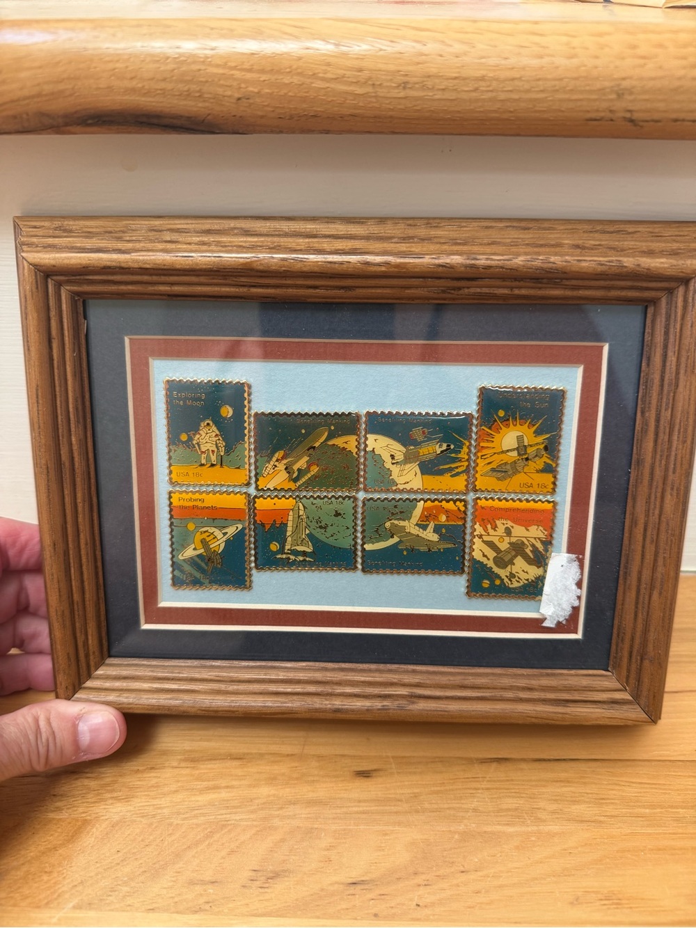 Framed Vintage US Space NASA metal stamps in pin designs